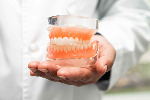Dental Implants vs Dentures: Which Tooth Replacement Is Better?